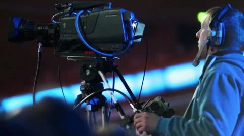Operator with video camera records performances on stage Stock Footage 62370315