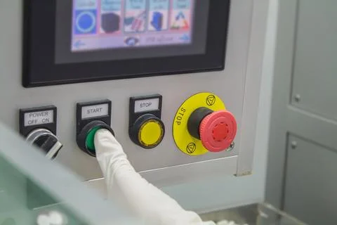 Operator work and fill substance in package machine in factory. Stock Photos