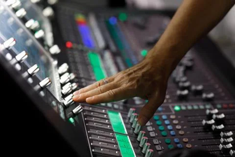 Operator working with audio mixer control panel Stock Photos