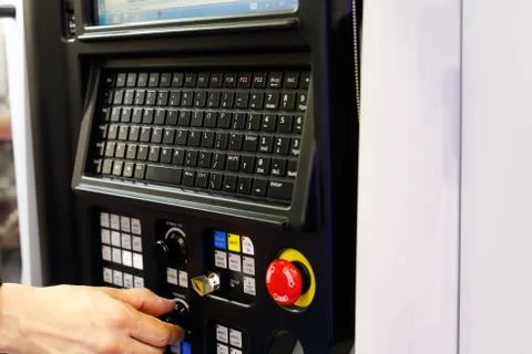 Operator working with CNC lathe machine Foto stock