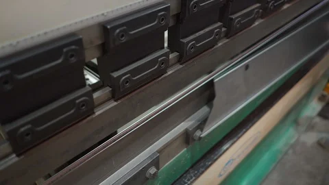 Operator working cut and bending metal sheet by high precision metal sheet Stock Footage 129525738