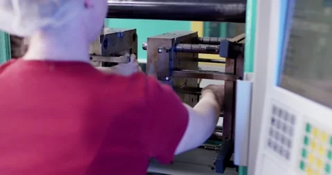 Operator Working at Injection Molding Control Panel, Factory Floor, Medium Shot Video stock 340664556