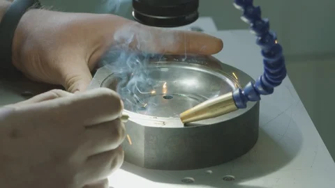 The operator is working on a laser welding machine. High-precision welding Video stock 128185010