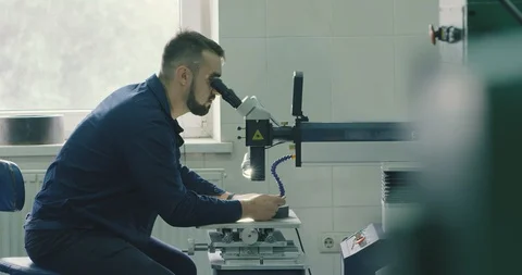 The operator is working on a laser welding machine. High-precision welding Video stock 128565111