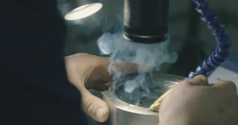 The operator is working on a laser welding machine. High-precision welding Stock Footage 129079303