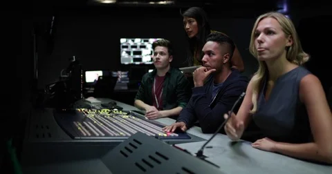 Operators in a control room at a television studio Stock Footage 82123290
