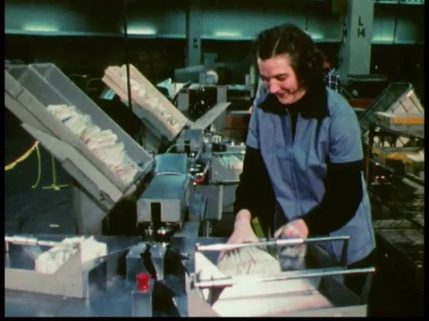Operators read zip codes and use letter sorting machines and mail travels in Stock Footage 79454286