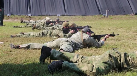 Operators Shoot from Lying and Kneeling Position Stock Footage 44188819