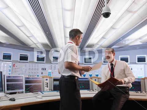 Operators Talking In Control Room