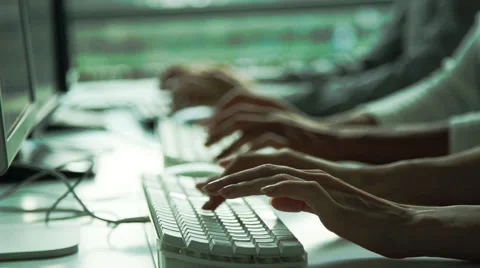 Operators typing in call center Stock Footage 63283691