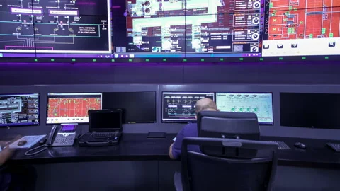 Operators working in a data center system control room offices timelapse Stock Footage 173416418