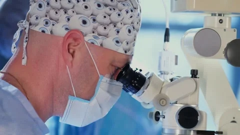 An ophthalmic surgery specialist performs an operation. Stockbeeldmateriaal 265012790