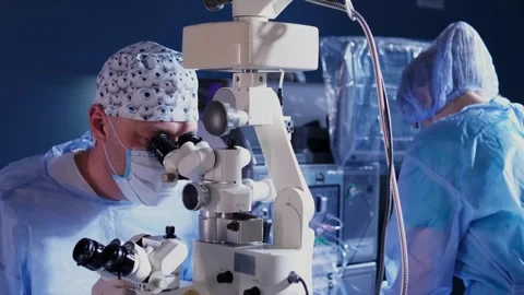An ophthalmic surgery specialist performs an operation Stock Footage 265017871