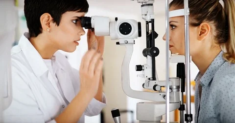 Ophthalmology concept. Patient eye vision examination in ophthalmological clinic Stock Footage