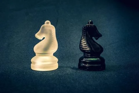 Opposing Knights face there differences face to face Stock Photos