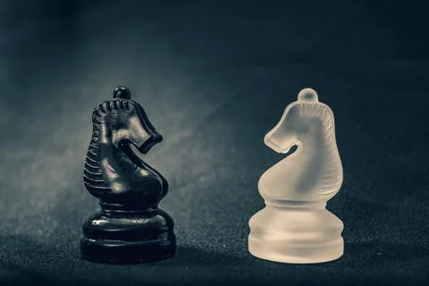 Opposing Knights face there differences face to face Stock Photos