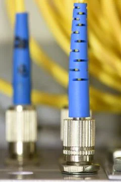 Optic fiber cables on distribution panel Stock Photos