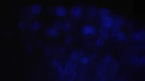 Optic fibres rotating slowly. Large bokeh, pull focus. Stock Footage 64712840