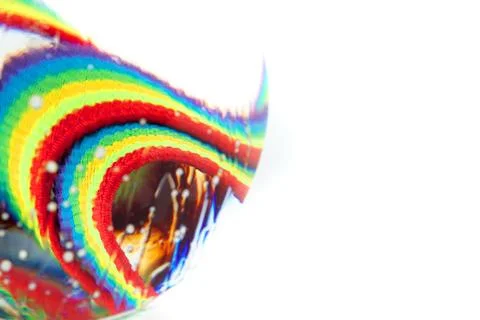 Optical abstract background of rainbow fabric with kinks and light effects in Stockfoto's