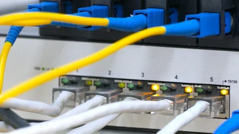 The optical and twisted pair are connected to the commutator. transfer of inform Stock Footage 88142851