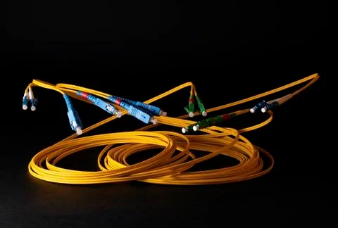 Optical Cables on black background Stock Photos