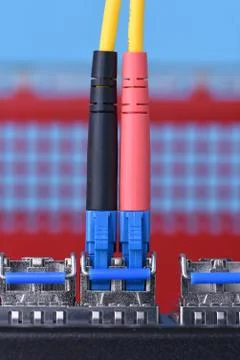 Optical cables connected to switch Foto stock