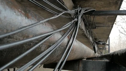 Optical communication cable laid under the bridge Stock Footage 126948816