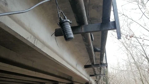 Optical communication cable laid under the bridge Stock Footage 126952022