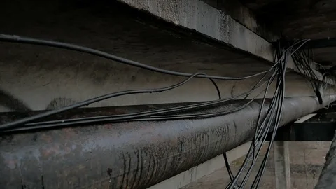 Optical communication cable laid under the bridge Stock Footage 126956231