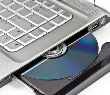 Optical Disc Ejected From A Laptop Stock Photos