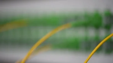 Optical distribution panel in motion with connected patch cord cable Stock Footage 86112300