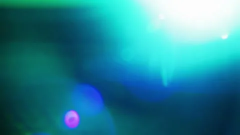 Optical effect, blue beam of light filling lens with a blue glow Stock Footage 276086856