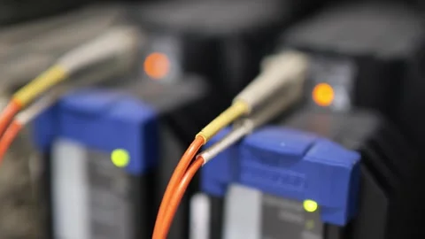 Optical fiber converter device processing and transmitting communication signals Vídeo Stock 343904502