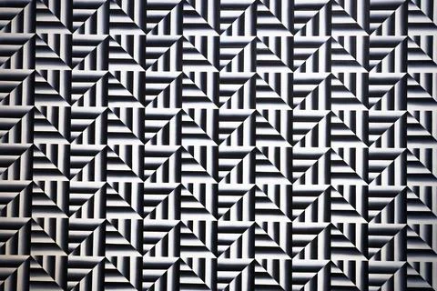 Optical illusion geometric pattern in black and white, repeating maze background Stock Photos