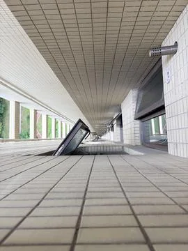 Optical Illusion of Tilted Windows and Geometric Building Perspective Stock Photos