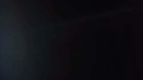 Optical Lens Flare Effect On Black Stock Footage 120247897