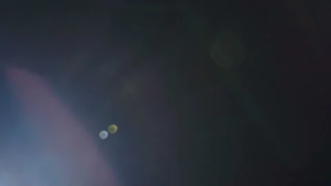Optical Lens Flare Effect On Black Video stock 120248240