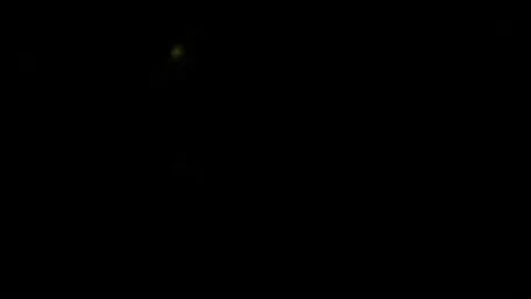 Optical lens flare, small rainbow speckles moving up Video stock 152123530