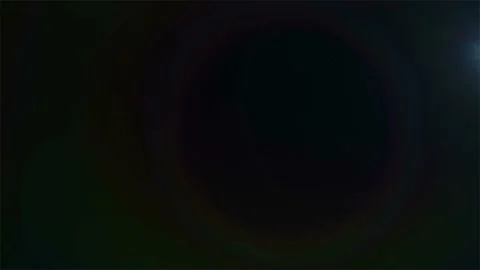 Optical lens flare transition effect over black background. Vídeo Stock 170996714