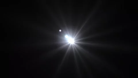  optical lens flares light moving from left to right. Optical lens flare effect. Stock Footage 296324423