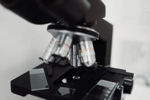 Optical microscope with interchangeable lenses microscopic examinations. Stock Photos