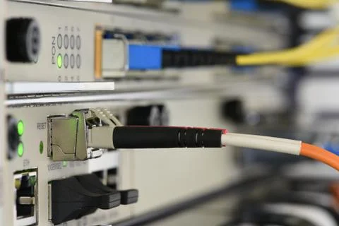 Optical network cables and devices in technology Stock Photos