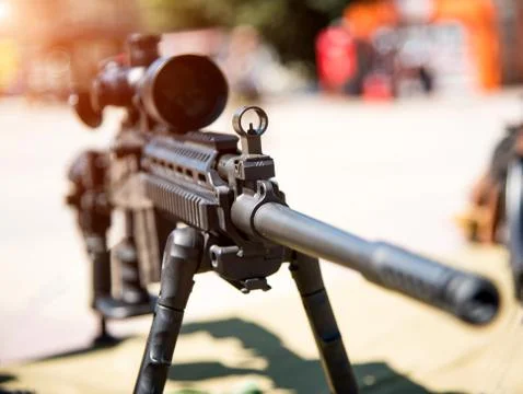 Optical sight on weapons close-up (danger, goal, terrorism - concept) Stock Photos