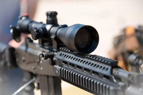 Optical sight on weapons close-up (danger, goal, terrorism - concept) Stock Photos