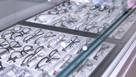 Optical store offers range of glasses for vision correction. Window of optical Video stock 257752129