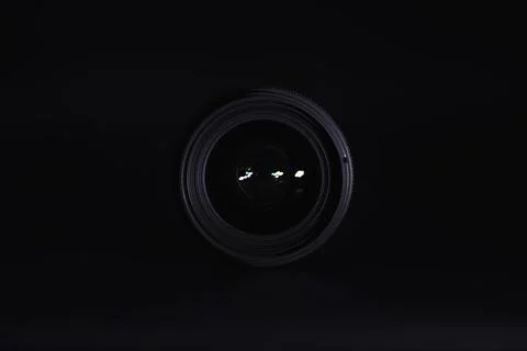 Optics to the camera on the operators desk. Flare in the glass of a photo l.. Stock Photos