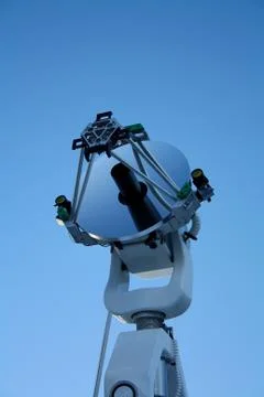 Optiical telescope on blue sky Stock Photos
