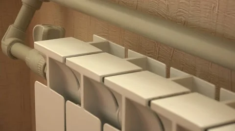 Optimal Setting of the Thermostat Valve. Radiator Adjustment to Save Energy. Rad Stock Footage 49136006