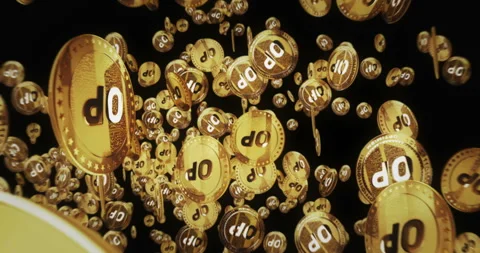 Optimism OP cryptocurrency flying between golden coins loop Stock Footage 270921225