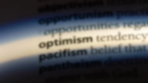 Optimism word in a dictionary. Stock Footage 99562306